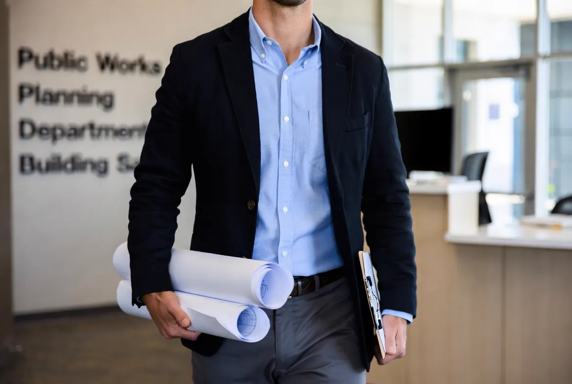 Construction permit coordination with city and regulatory departments for approved building plans